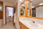 Spacious master bathroom offers twin vanities, perfect for getting ready for the day